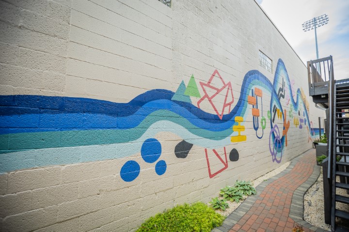 Colorful mural and walkway at our office